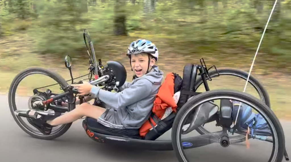 Danik on his electric assist handcycle